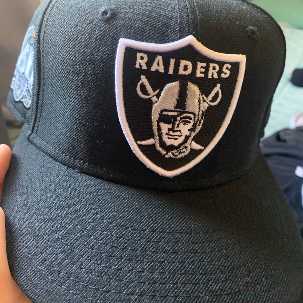 Raiders 7 1/4 black new era fitted hat